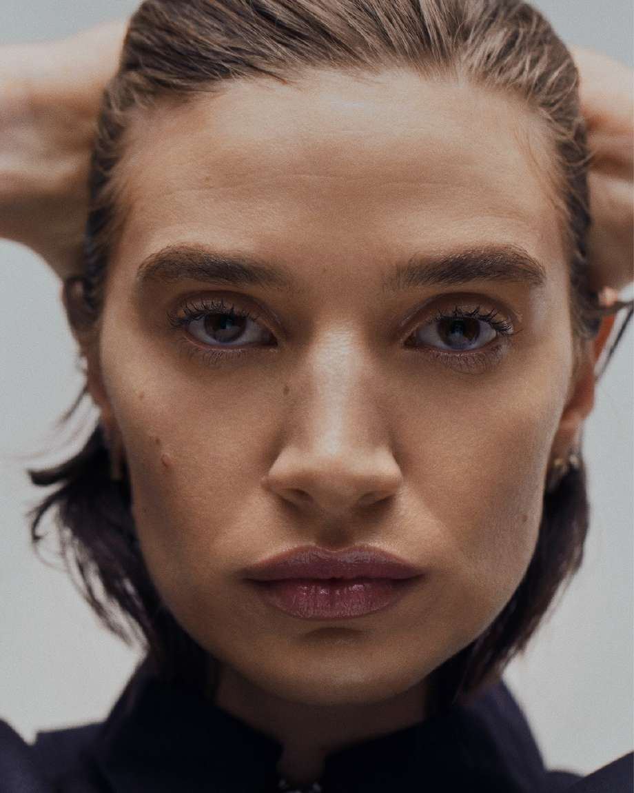 Close-up editorial portrait of a woman
